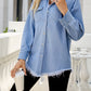 Women's distressed raw edge denim shirt